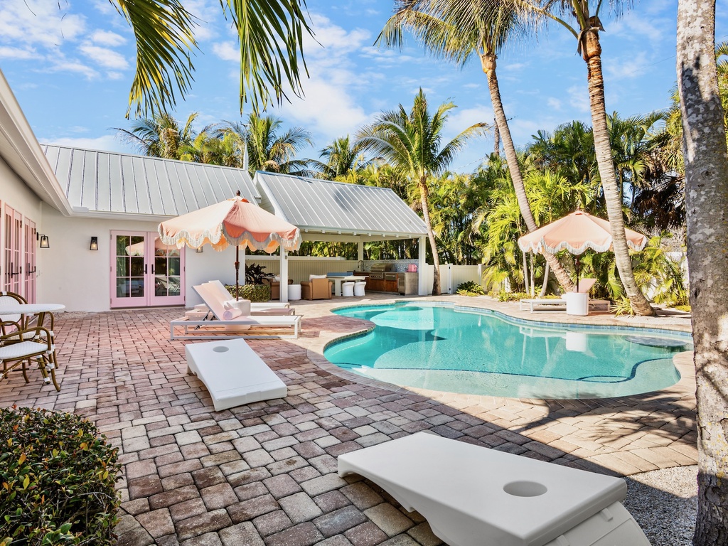 Private oasis with pool and cornhole