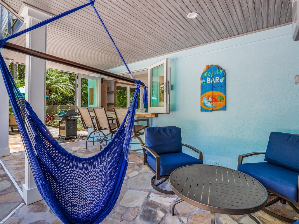 Relax in your private hammock while enjoying tropical breezes on this covered terrace with comfortable seating.