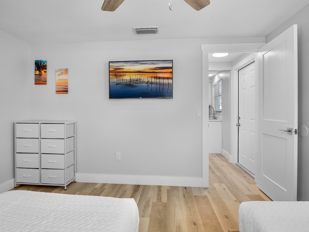 Second bedroom with two twin beds.