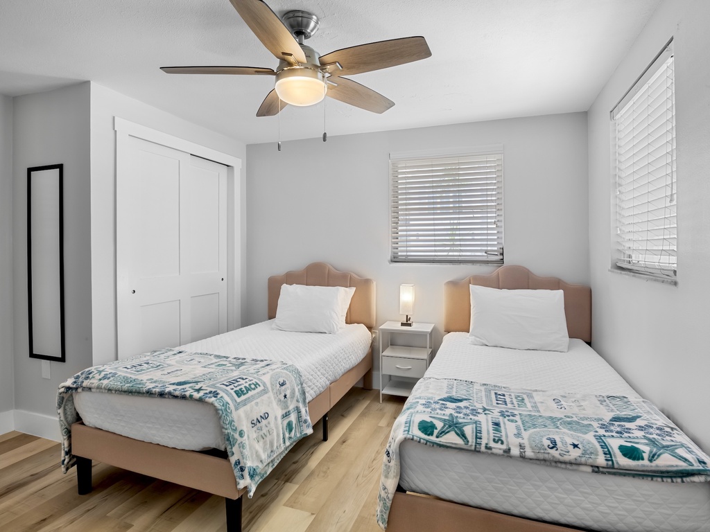 Second bedroom with two twin beds - great for kids or friends.