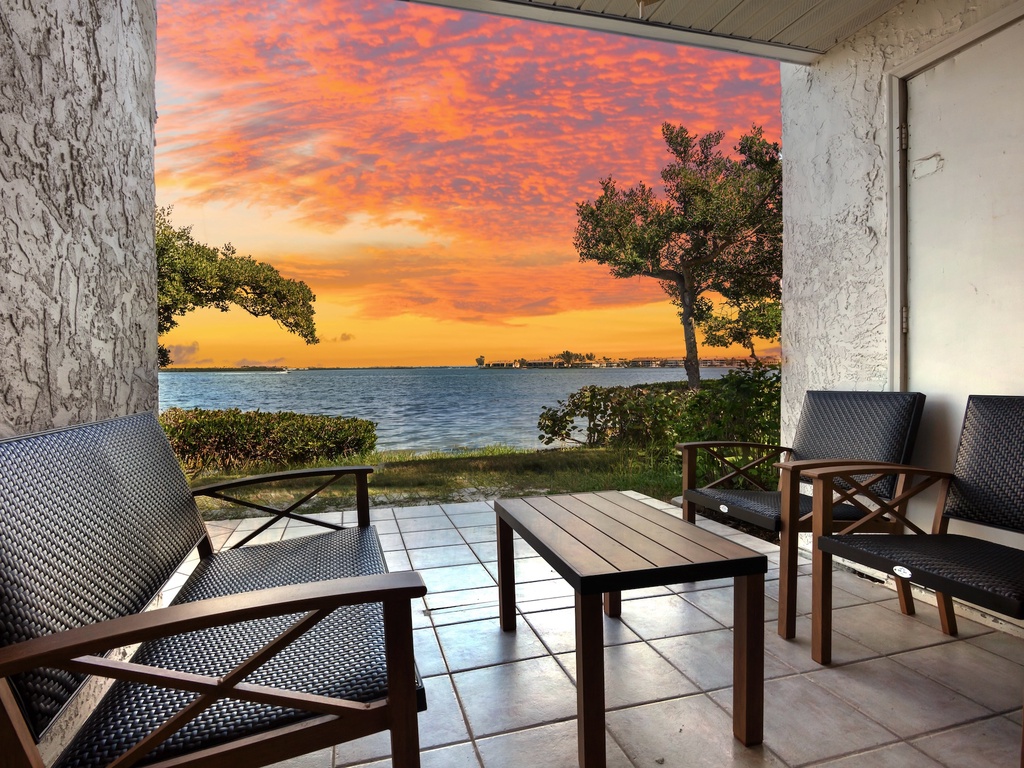 Private covered patio with outdoor seating