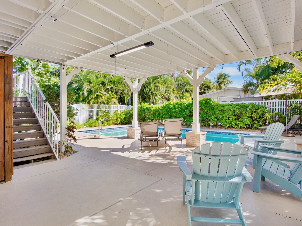 Private poolside oasis with comfortable seating