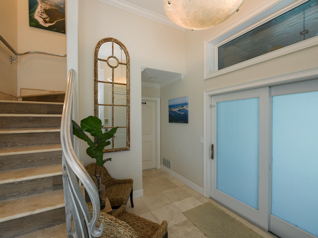 Side A - Foyer - Access To Pool Area