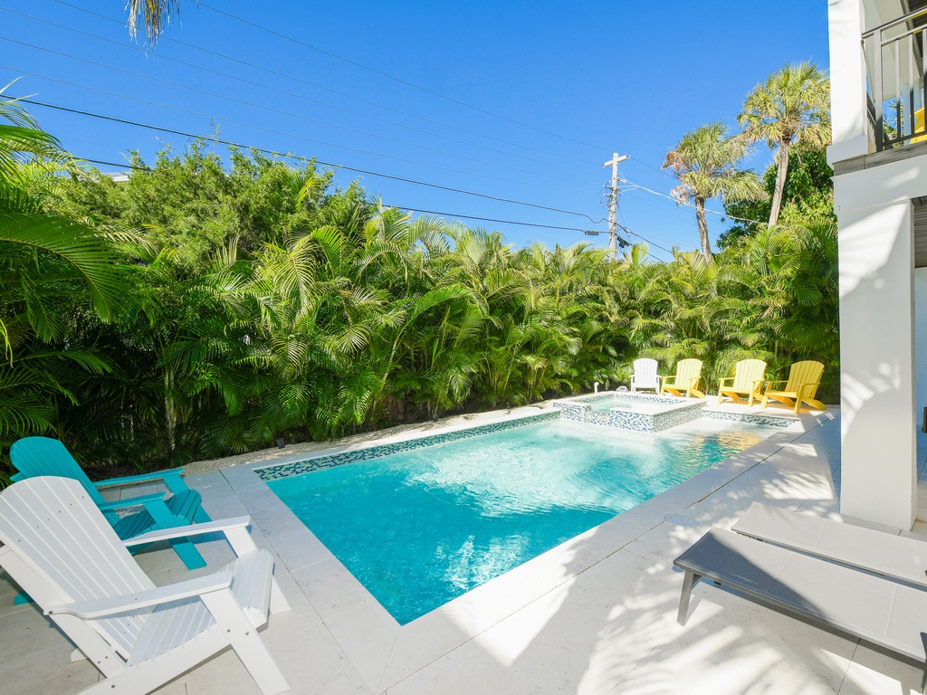 Pool area with relaxing loungers