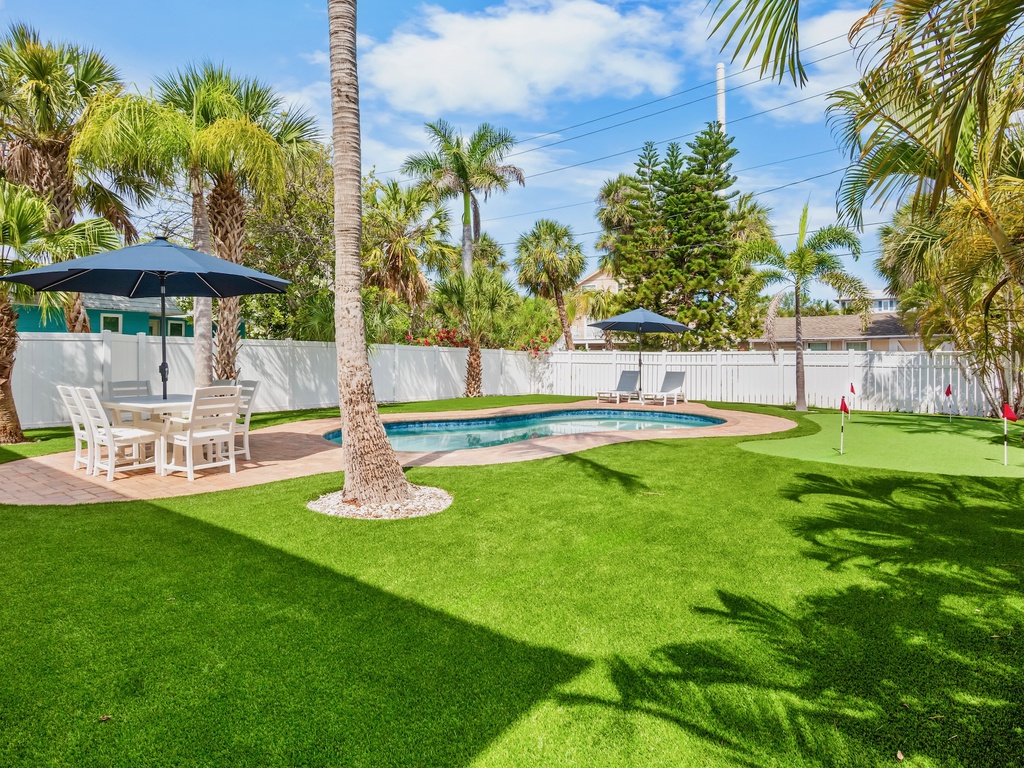 Backyard with Pool, Putting Green & Outdoor Dining