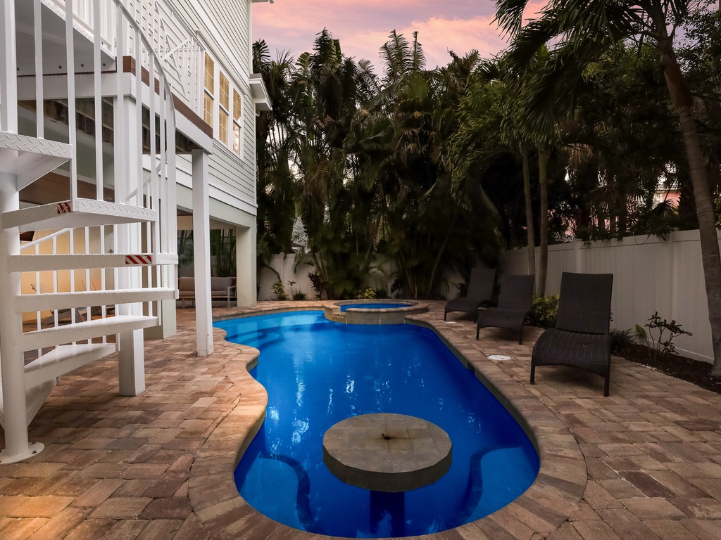 Private heated pool and swim-up table