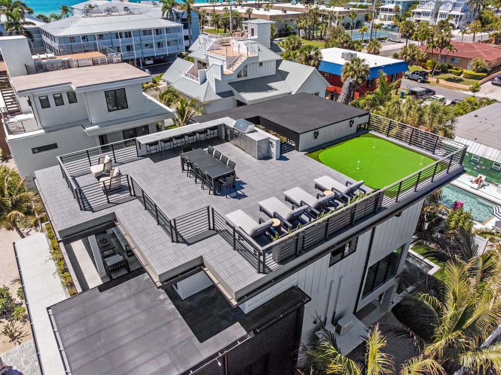 Rooftop deck with outdoor kitchen, putting green and Gulf views