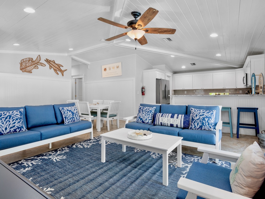 Bright living space with comfortable blue seating