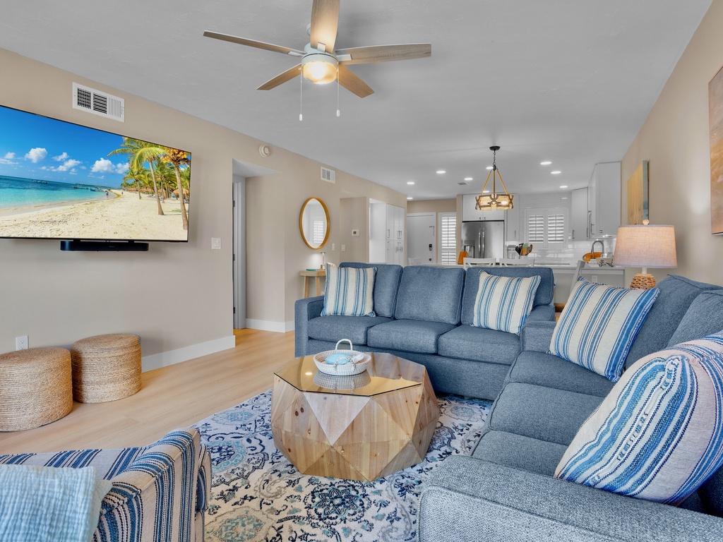 Living area with plush seating and TV