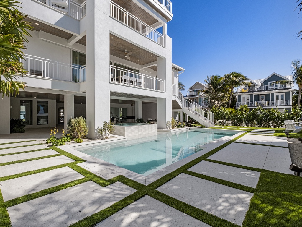 Private pool surrounded by tropical landscaping