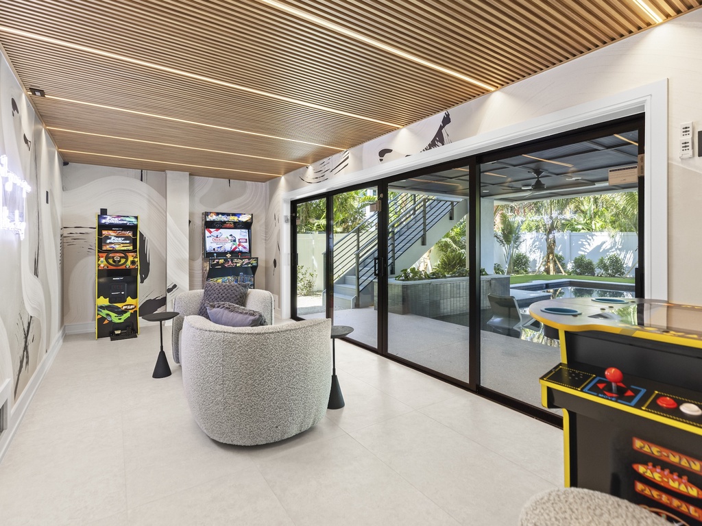 Game Room with Arcade Games and Lounge