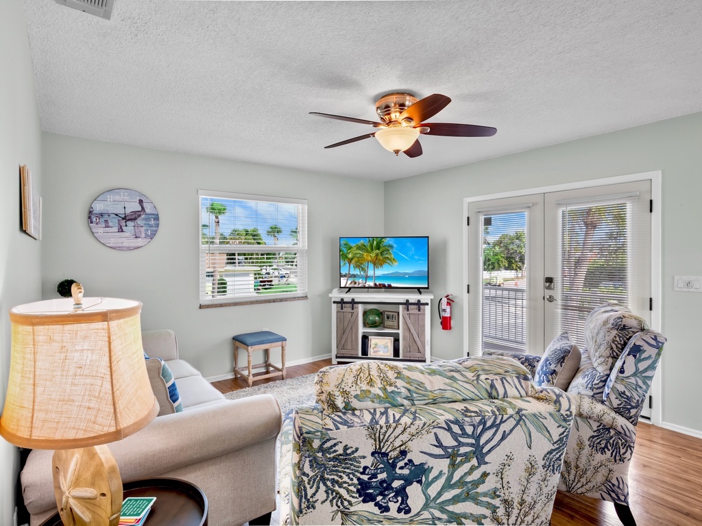 Living Room with Plush Seating and TV