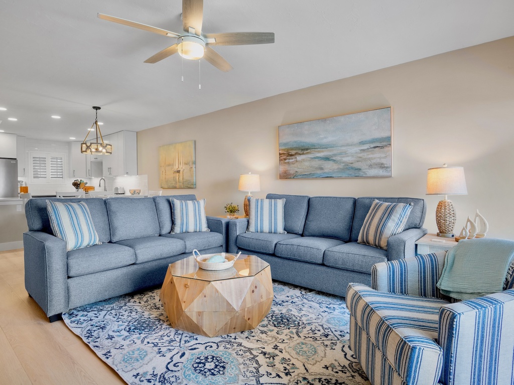 Living area with coastal blue sectional seating