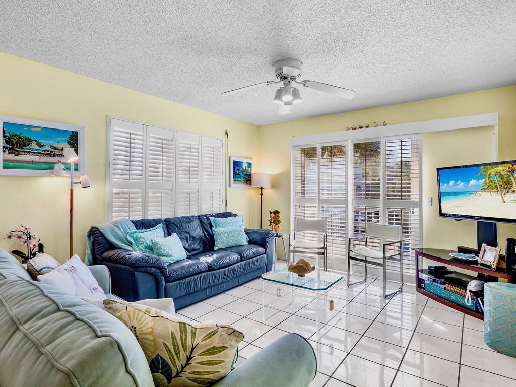 Living Room with Plush Seating and TV