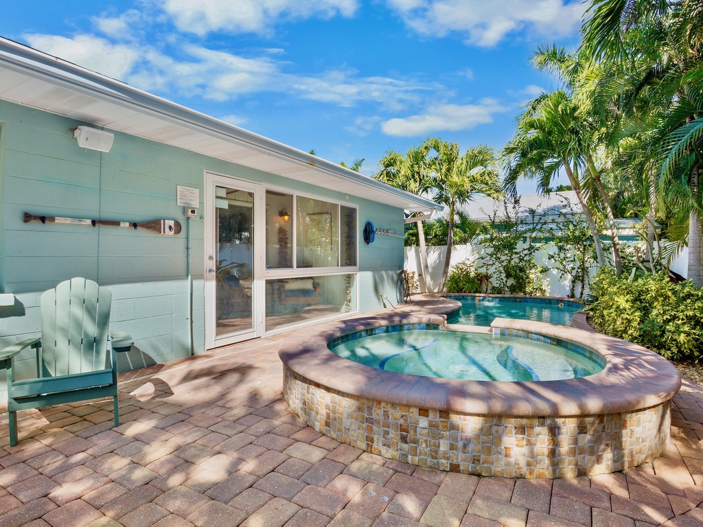 Private oasis with heated pool with in-ground spa