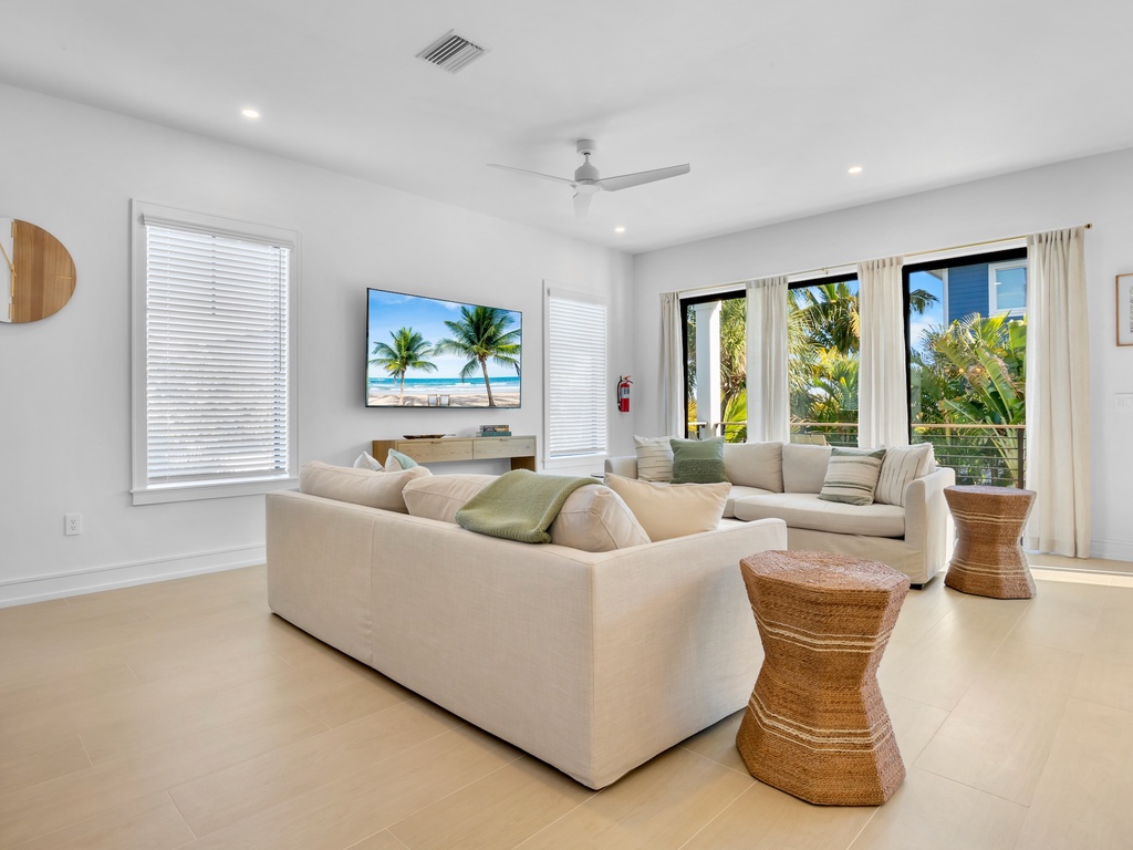Living area with TV and sliding doors to your private terrace