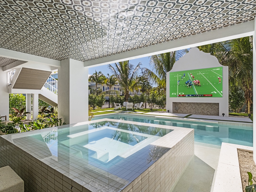 Private hot tub with outdoor TV entertainment