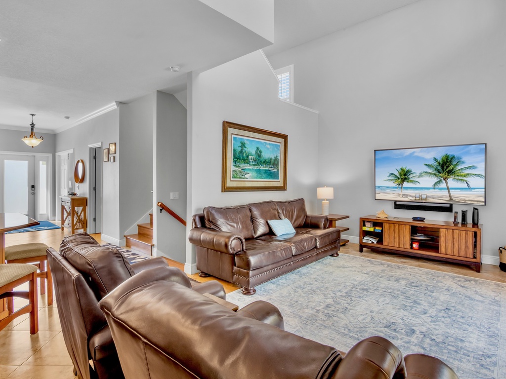 Living area with plush seating and TV