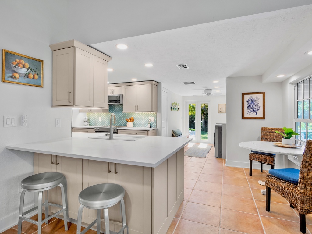 Stylish island with barstools