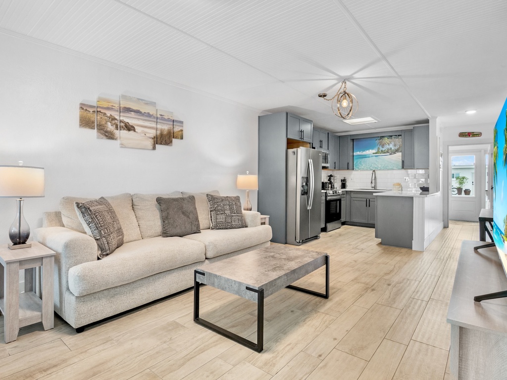 Living Room with Plush Seating and TV