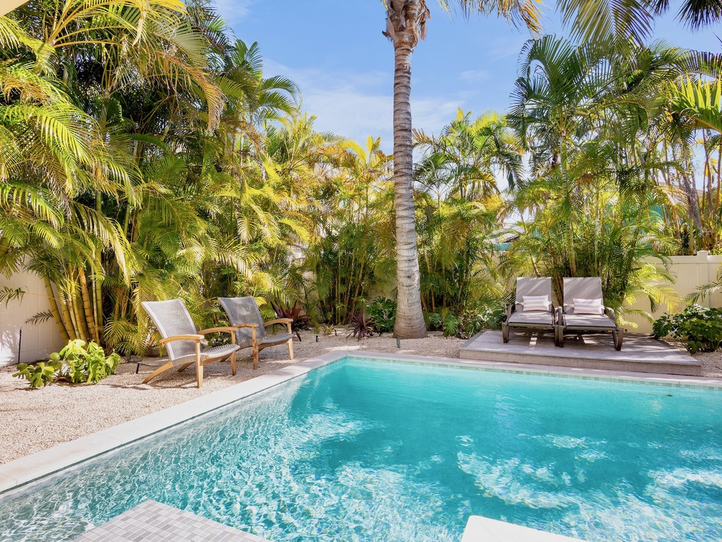 Private pool and poolside lounging