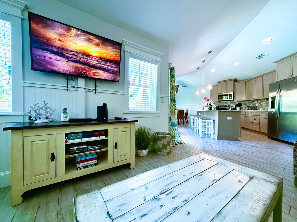 Open Concept Living Space with TV and Games