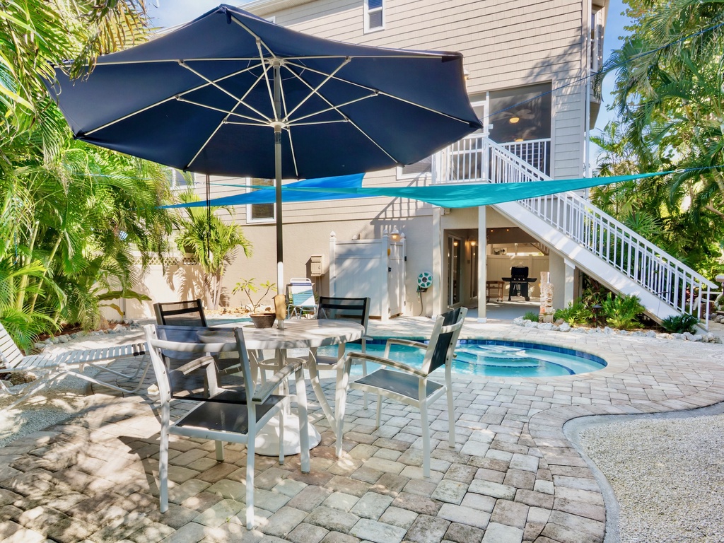 Private Heated Pool with shaded dining area