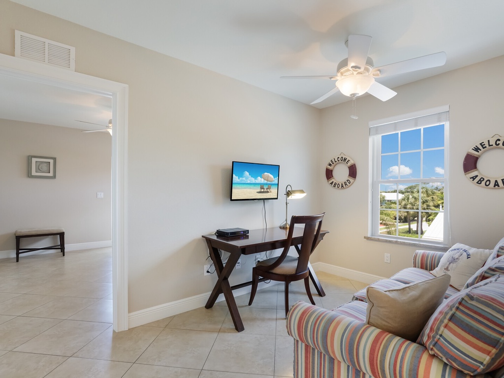 Sitting Area with Desk and Sleeper Sofa
