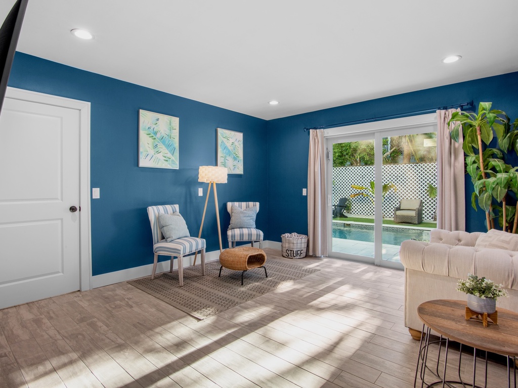 Living area with sliding doors to private pool - 1st floor