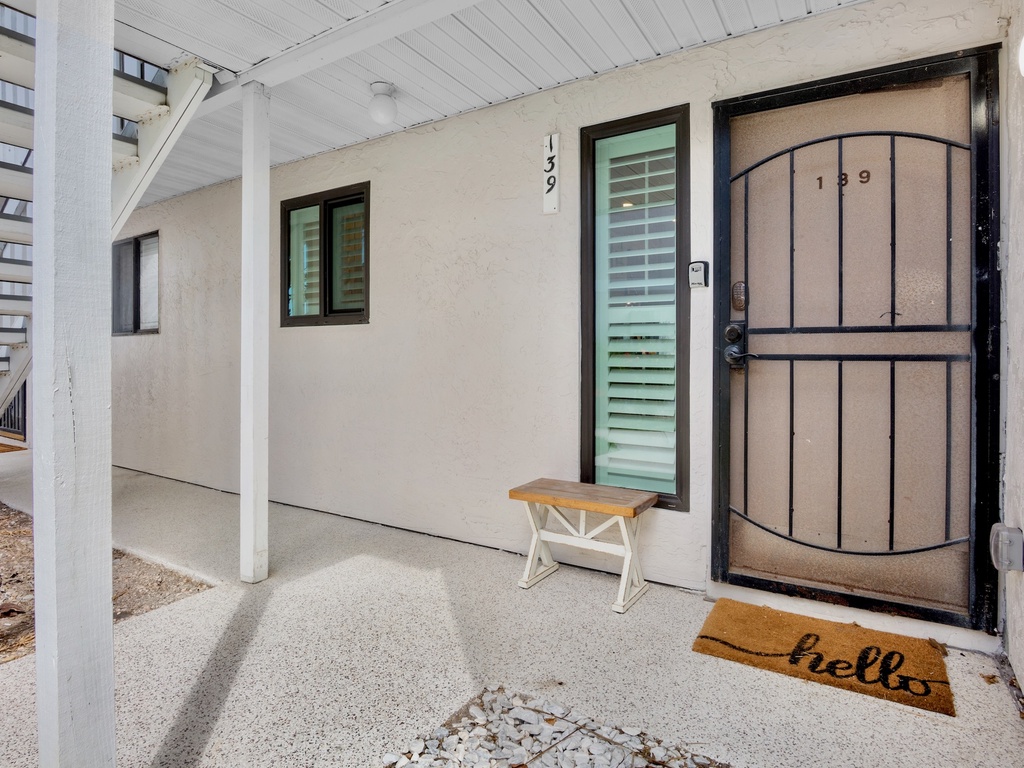 Entrance with seating bench.