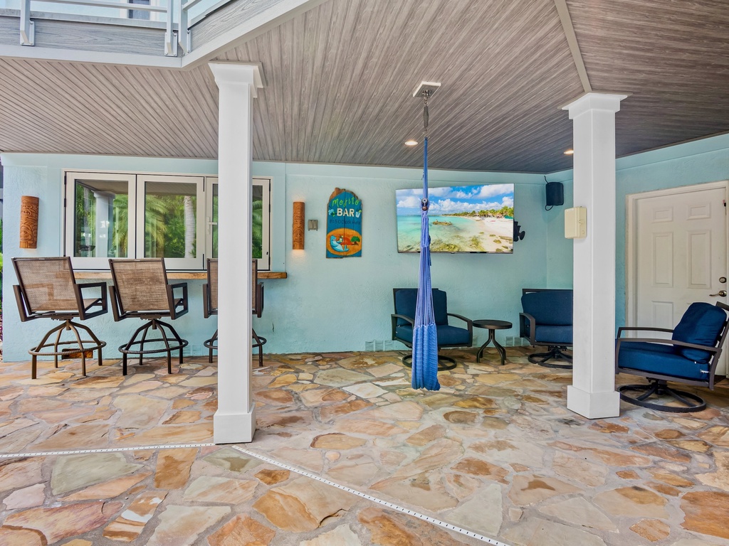 Outdoor Lounge Area with TV