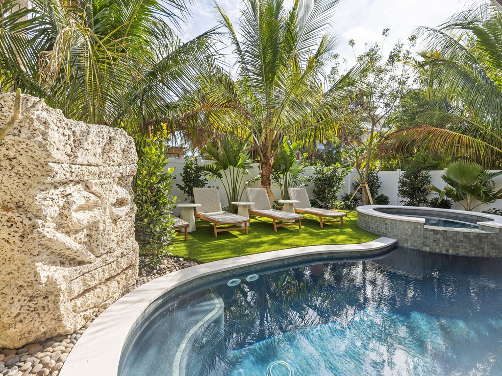 Private poolside loungers for sunbathing
