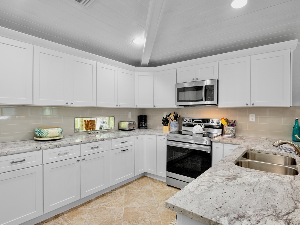 Fully equipped kitchen with ample storage space