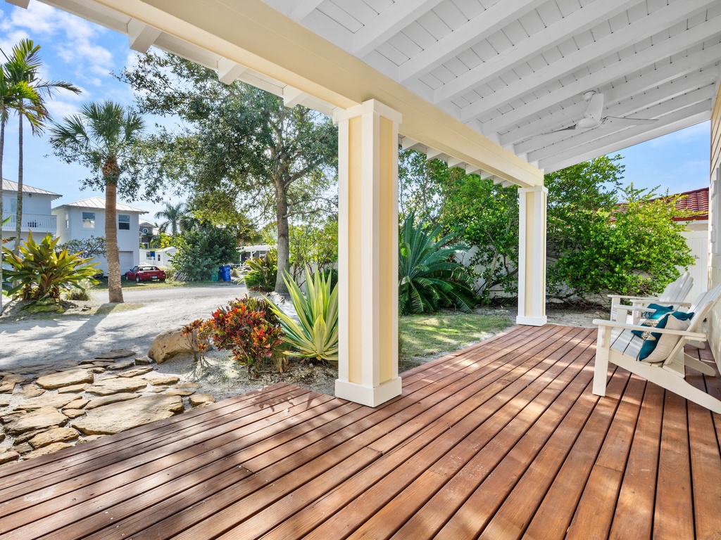 Private covered deck with tropical garden views