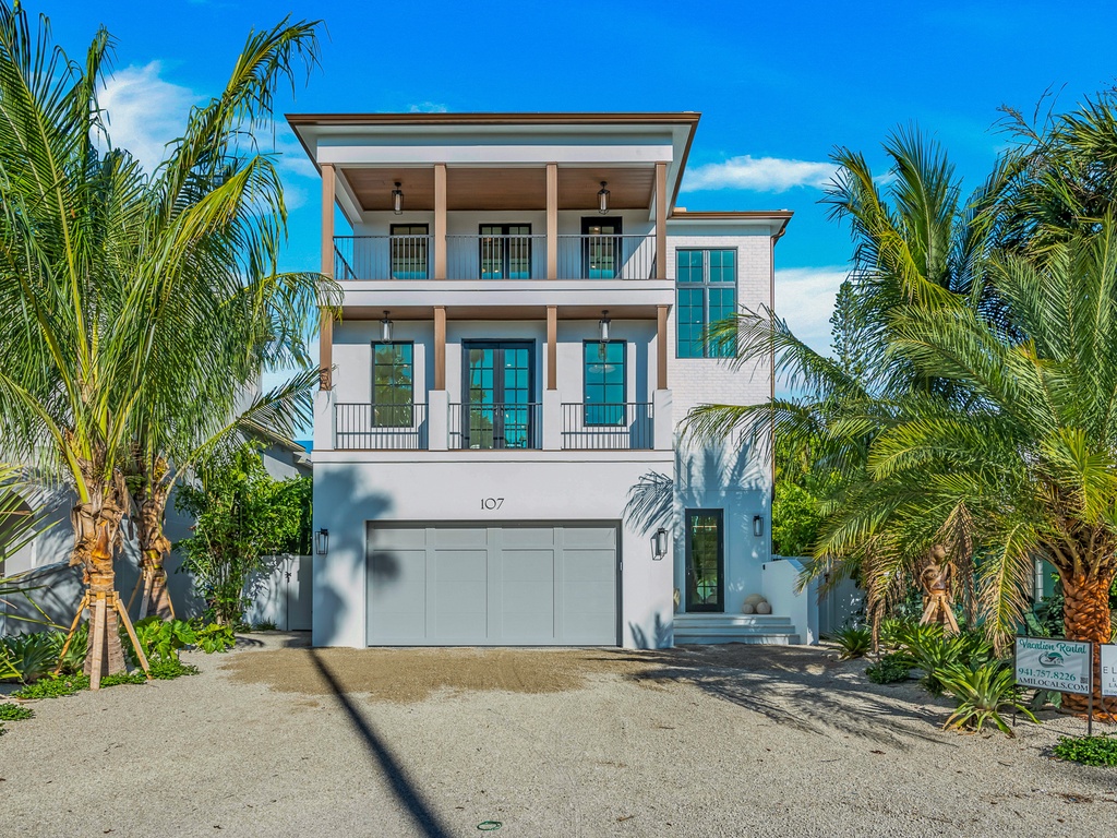 House exterior with lush landscaping