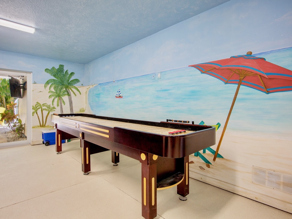 Game Room with Shuffleboard Table