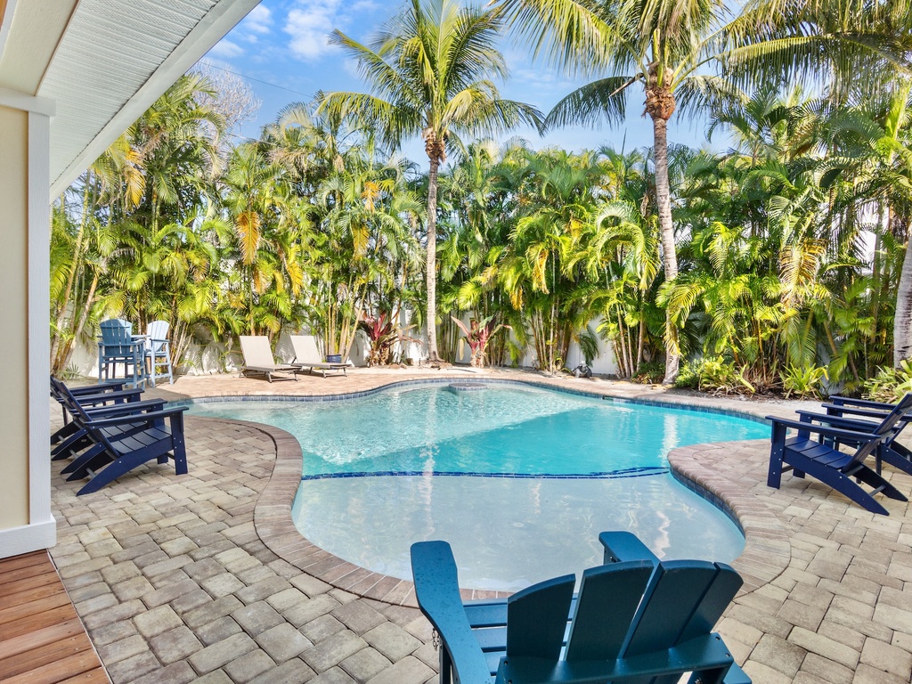 Tropical oasis with Adirondack chairs
