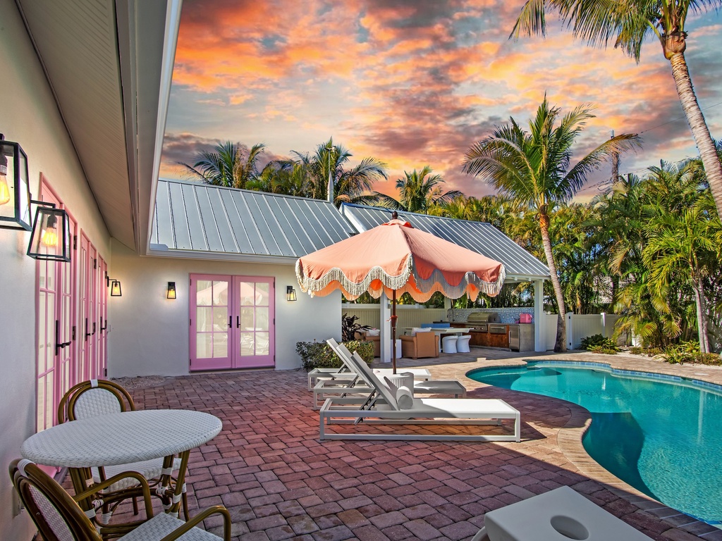 Tropical paradise with private pool, loungers, and sunset views