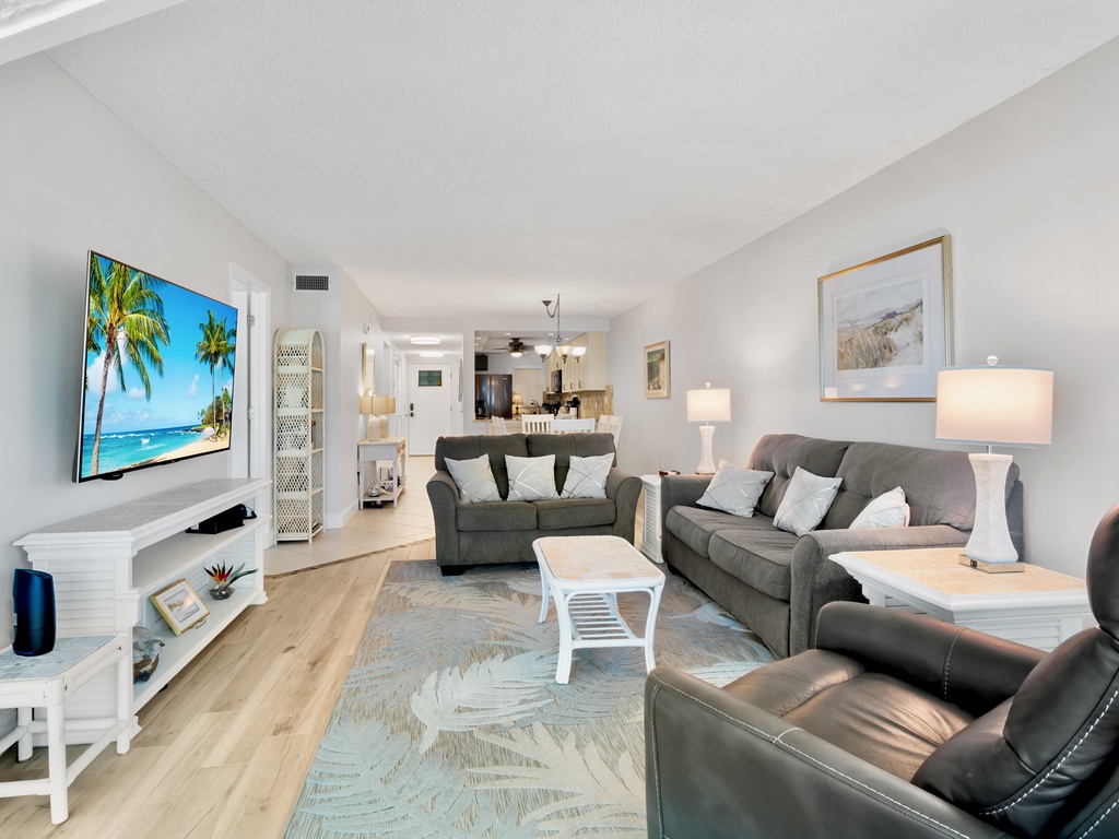 Living area with plush seating and TV