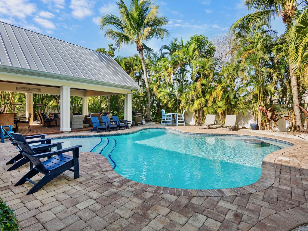 Tropical oasis with Adirondack chairs
