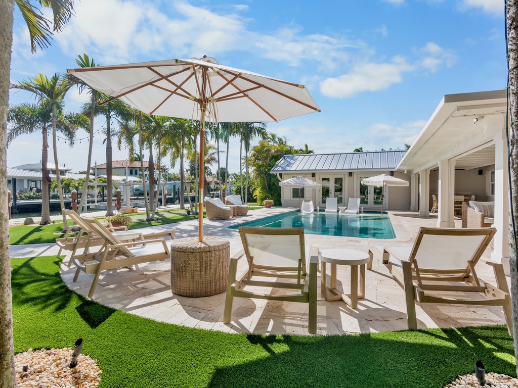 Private heated pool and outdoor lounge chairs