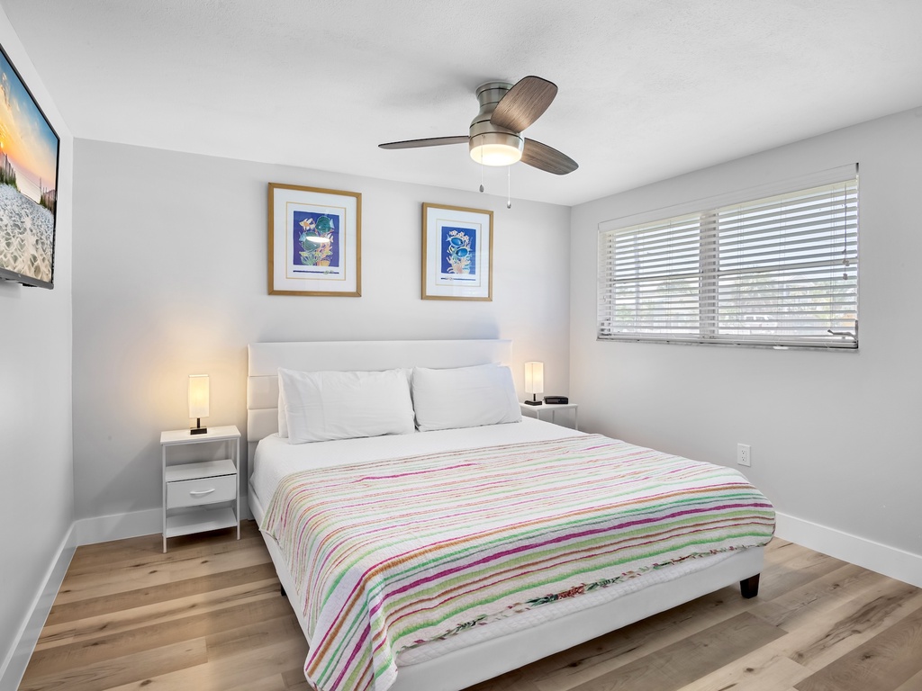 Relaxing primary bedroom retreat with king bed.