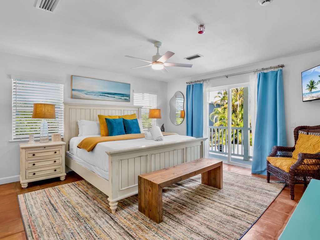 Primary Bedroom, King bed, workspace, and balcony
