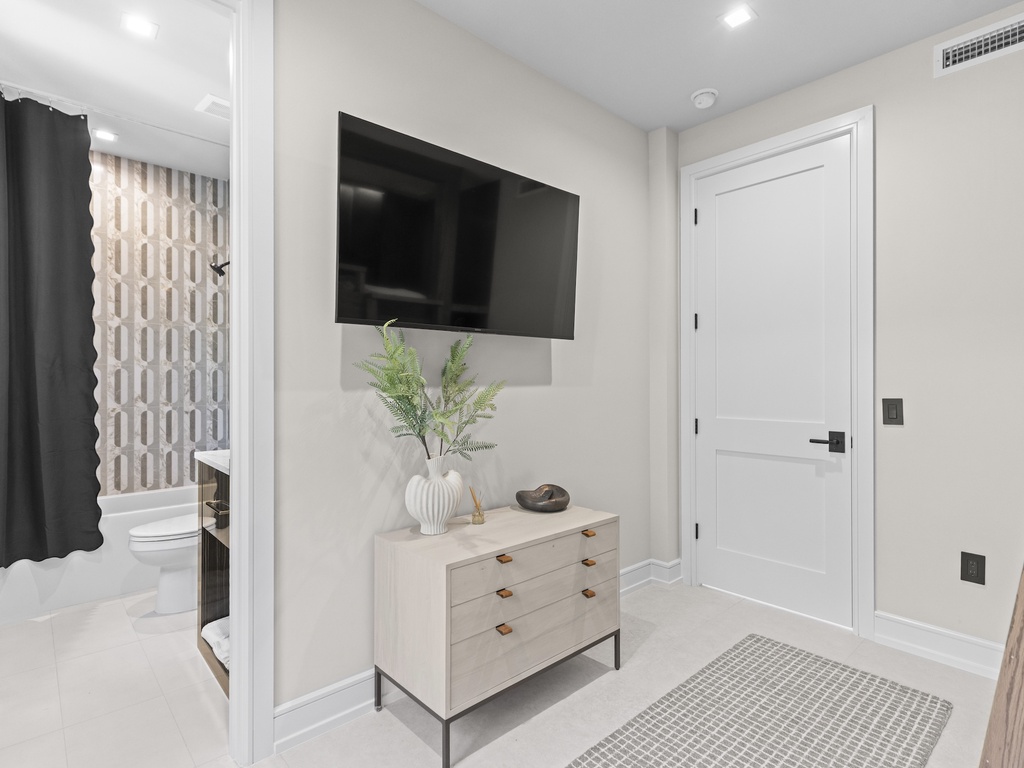 Fourth Bedroom, Full over Full bunk bed and TV