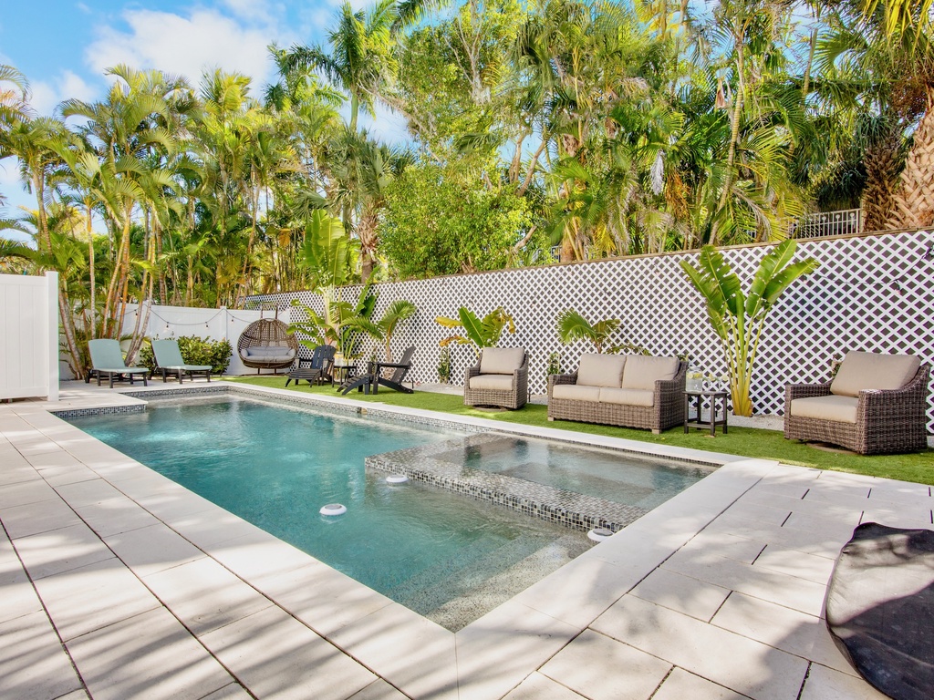 Private pool with in-ground spa and lounge seating