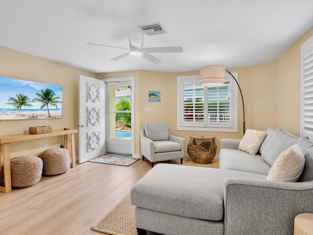 Living Room with Plush Seating and TV