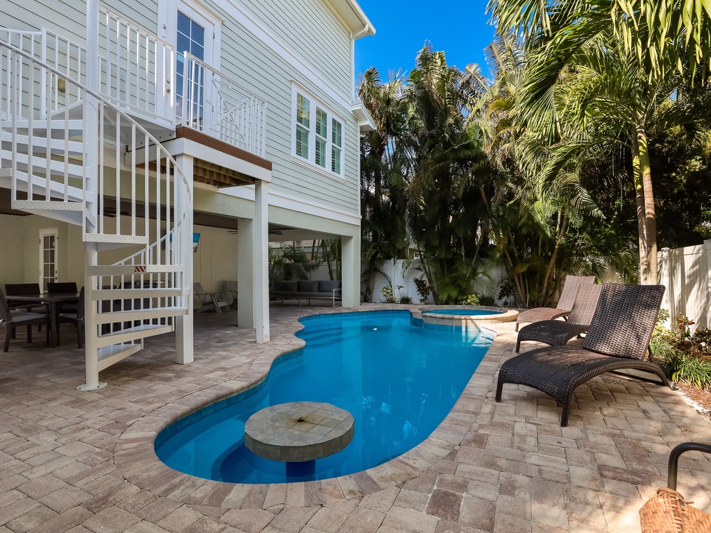 Private heated pool and swim-up table