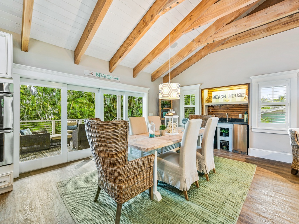 Dining Area with Wet bar and Balcony Access