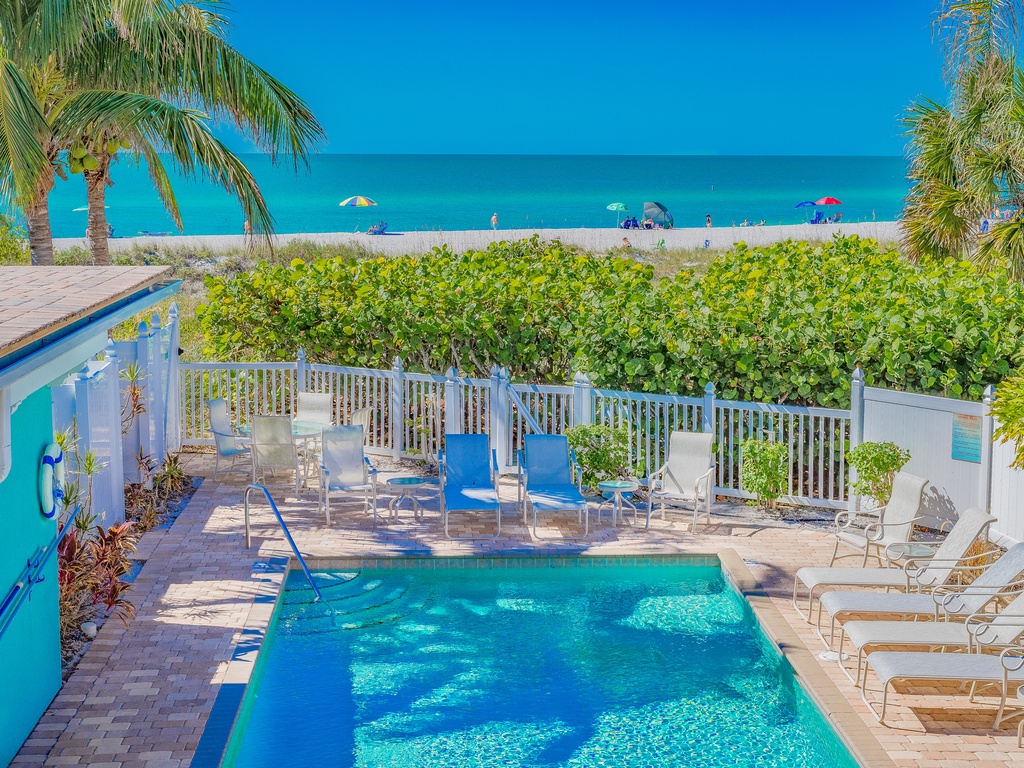 Heated Beachfront Community Pool and Loungers