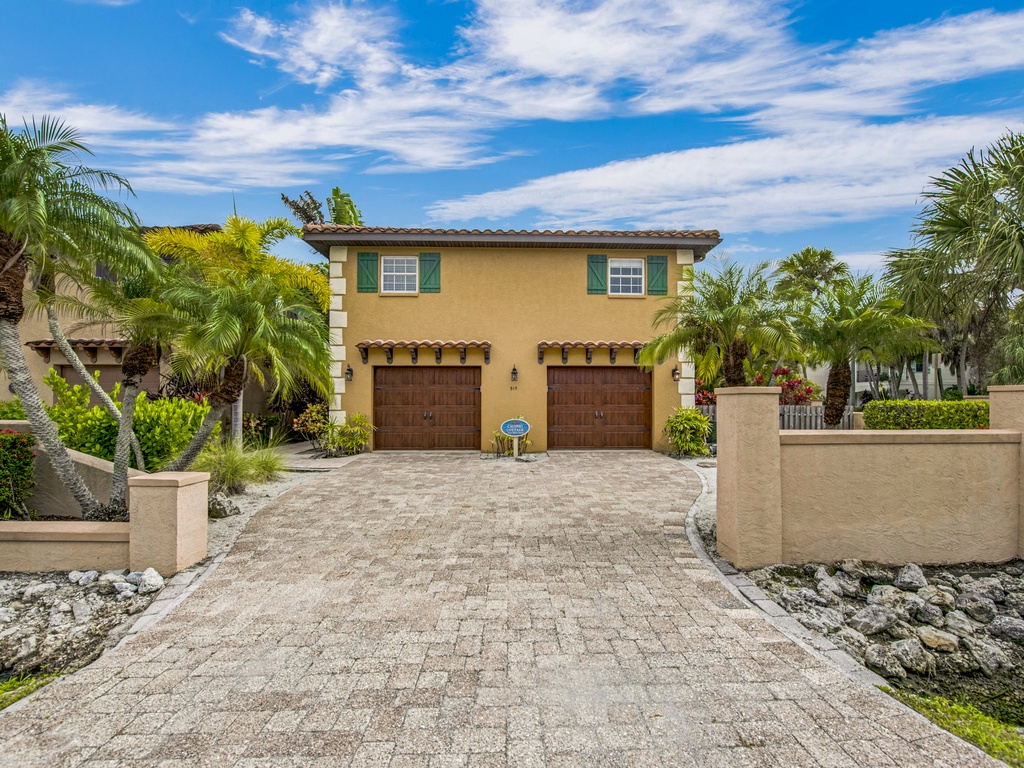 Exterior of Calypso Cottage by Anna Maria Vacations